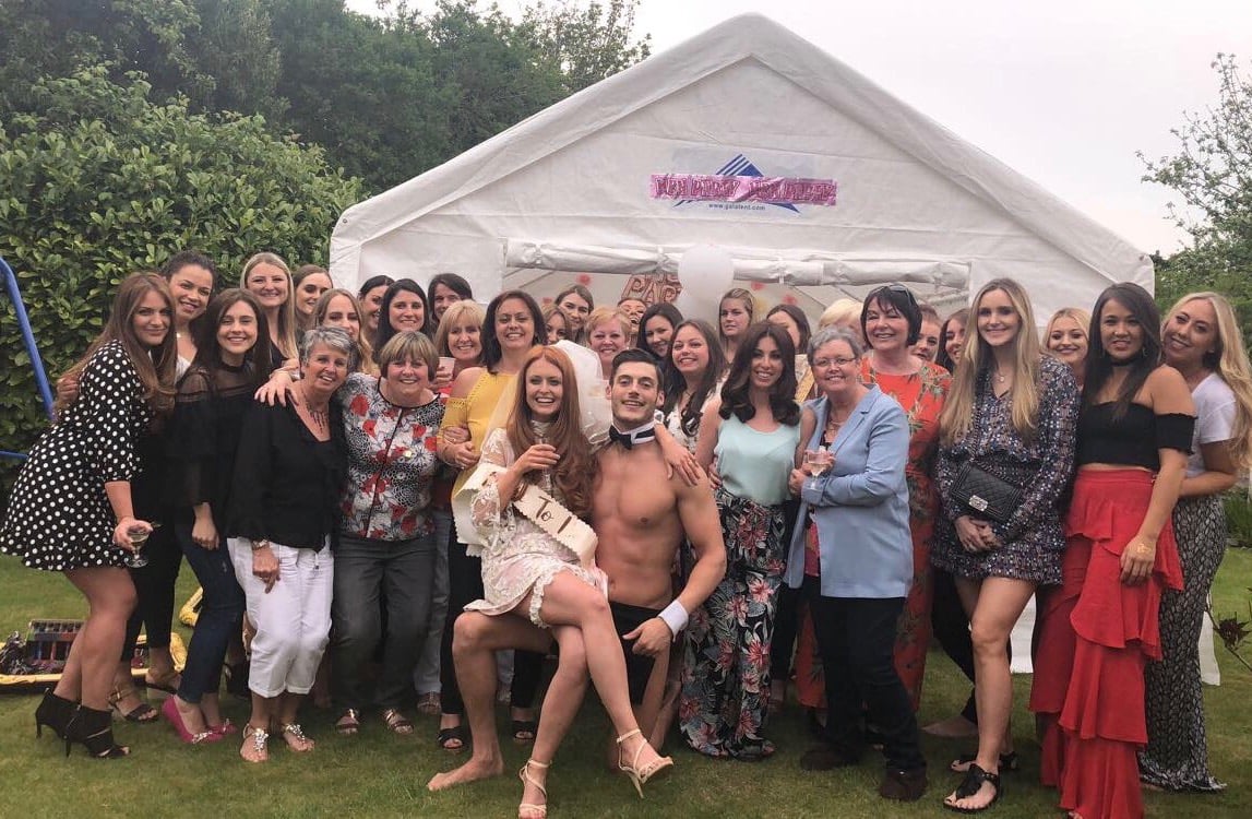 hen party group with a buff butler
